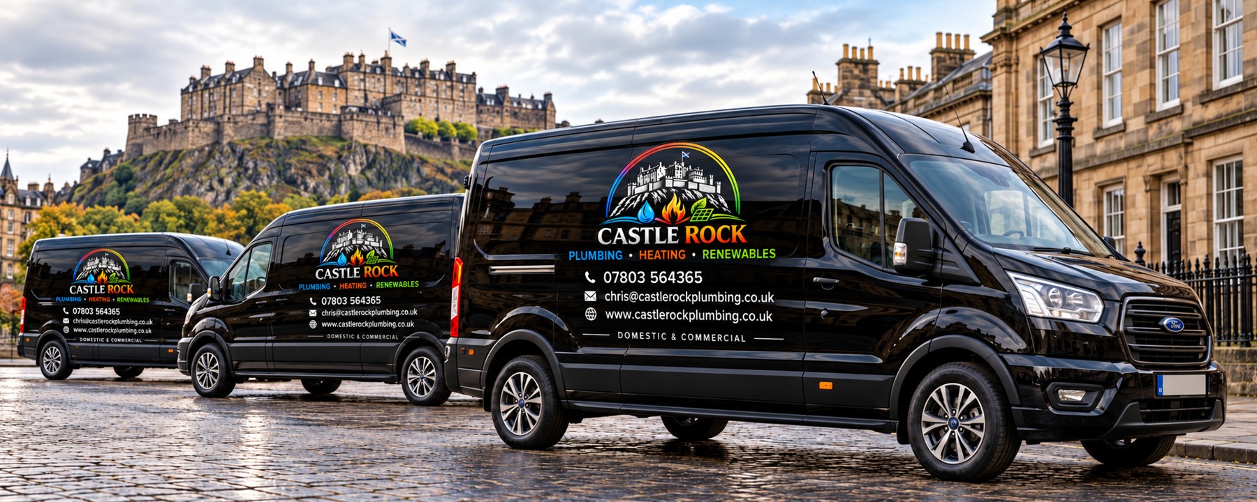 Three black vans with Castle Rock Plumbing, Heating and Renewables signwriting and contact details